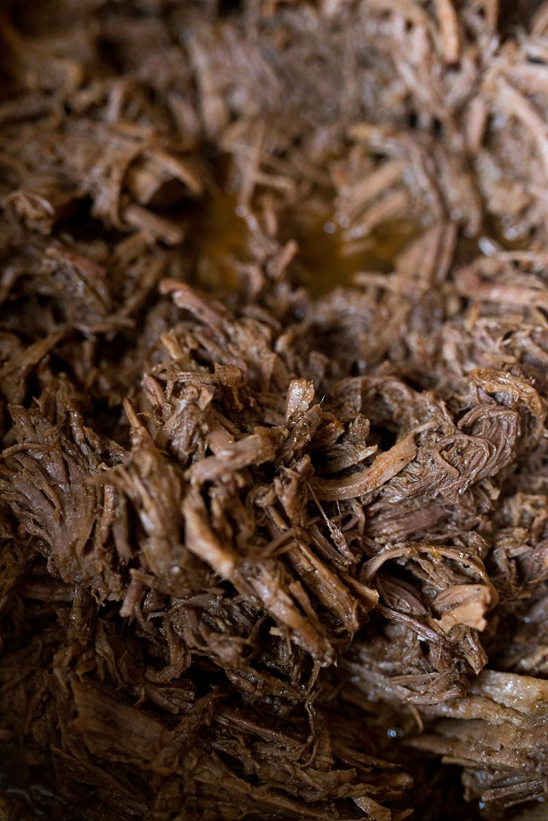 This slow cooker beef barbacoa recipe comes together in 5 minutes and cooks all day or till tender and falling apart. Dinner & leftovers will be delicious! from FirstandFull.com