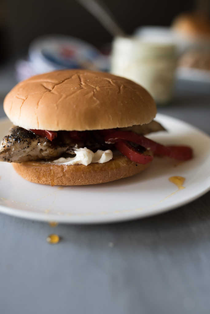 The best grilled chicken sandwich you will EVER have. Tender + juicy, grilled chicken breast, sautéed peppers & onions with a delicious cream cheese spread.