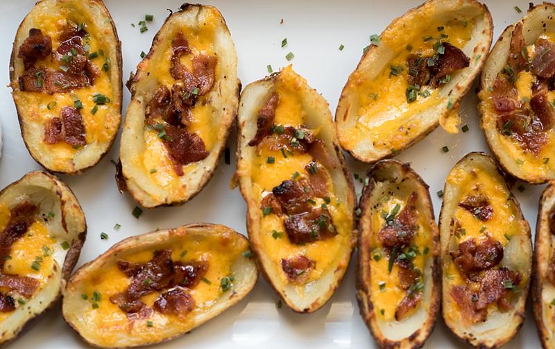 These crispy baked potato skins,topped with cheese and bacon, have all the makings of a sinful appetizer but are baked as opposed to fried. firstandfull.com