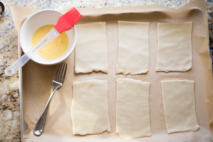 These homemade pop-tarts are flavorful and made with REAL ingredients. I stuck with a homemade pie crust, easy cherry berry jam and light glaze. 