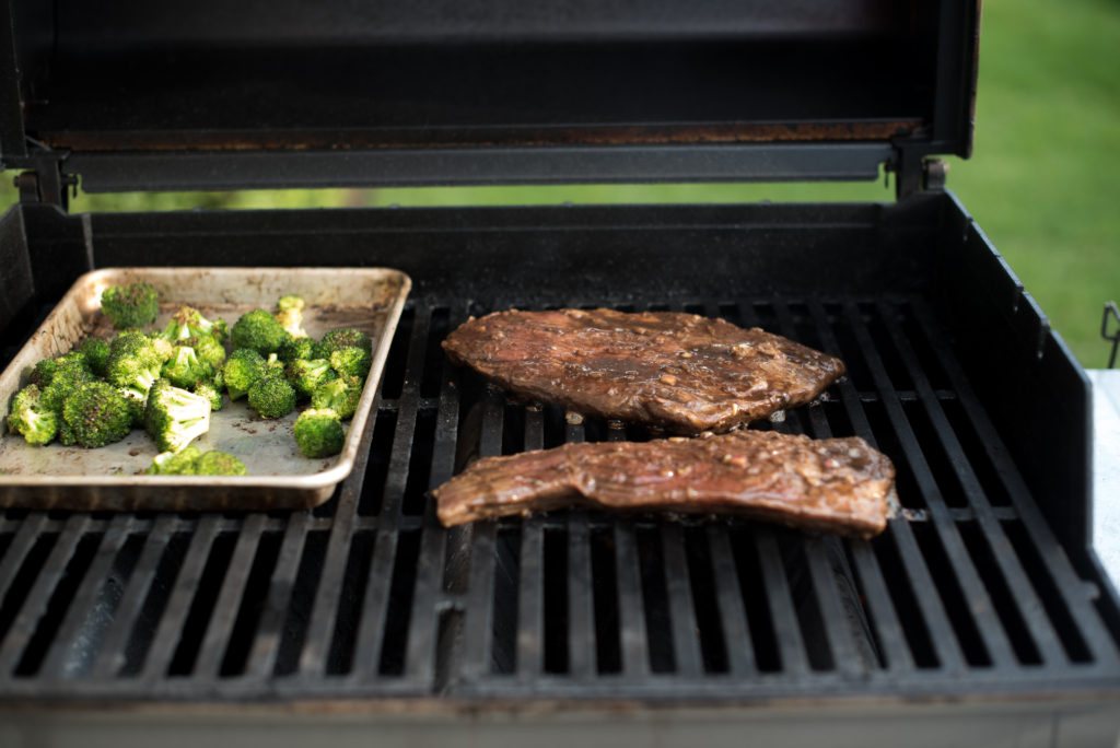 An easy flank steak marinade perfect for weeknight grilling. It's got soy sauce, ginger, garlic, and honey to create the most delicious and tender steak. | FirstandFull.com