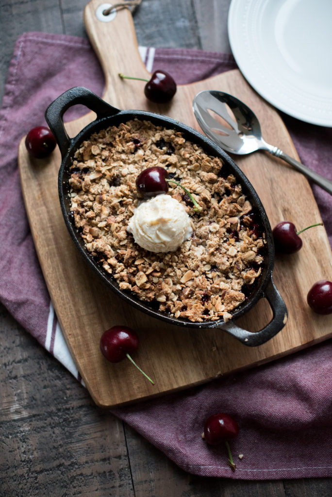 This almond cherry crisp uses fresh, cherries, slightly sweetened & is topped with a nutty, crunchy crust made with sliced almonds, oatmeal and brown sugar.