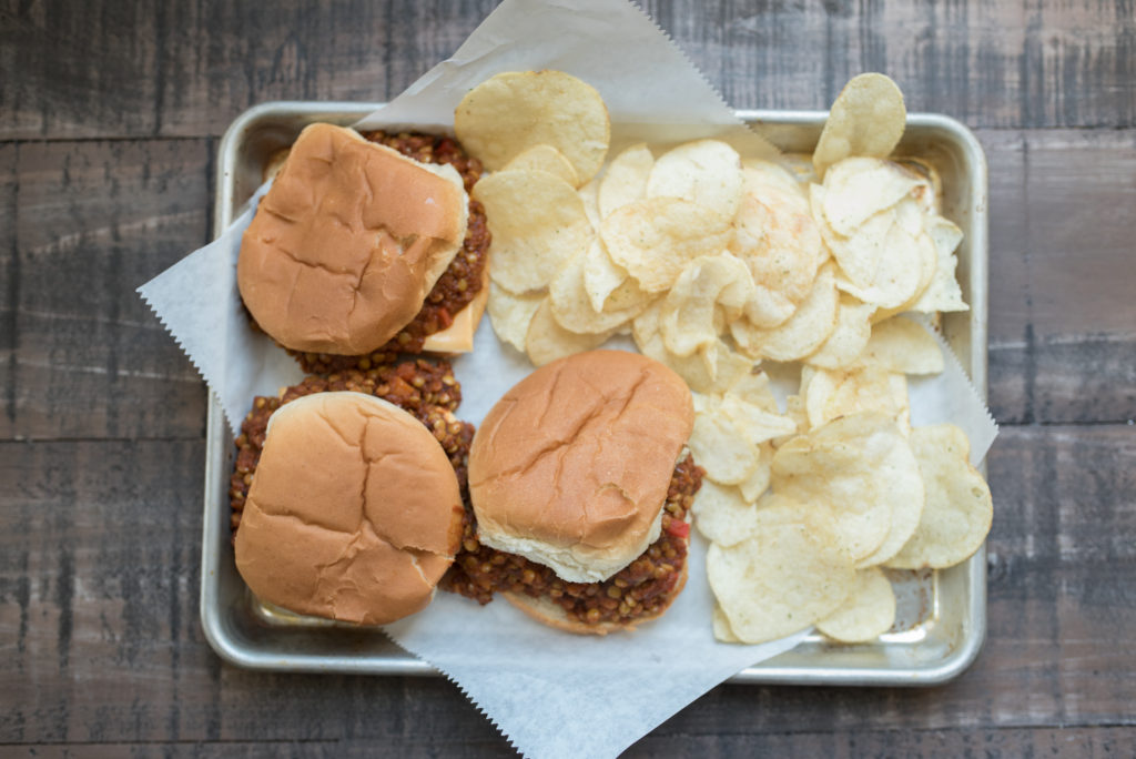 Vegetarian Lentil Sloppy Joes featuring a thick, hearty, and flavorful sauce piled high on hamburger buns! A modern take on the ones from your childhood.