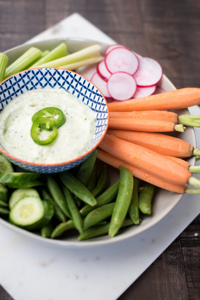 A cool and creamy jalapeno feta vegetable dip with crumbled feta cheese, fresh jalapeños, roasted garlic, and whipped cream cheese. 