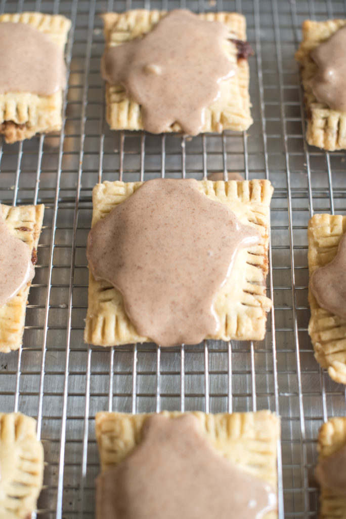 Homemade Brown Sugar Cinnamon Pop-Tarts: A crispy pastry, filled with cinnamon sugar, topped with a delicious sugary glaze. Pop- Tarts for kids + adults! 