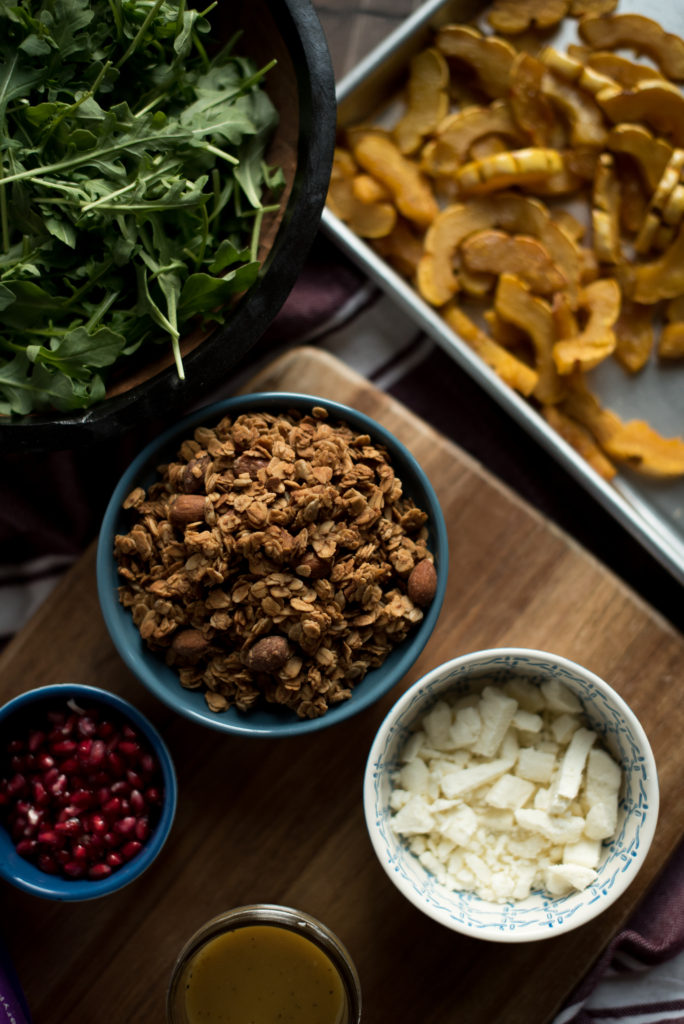 Delicious Fall Inspired Salad: Roasted Delicata Maple Salad with roasted squash, pomegranate, feta, granola, and a delicious apple cider vinaigrette. 