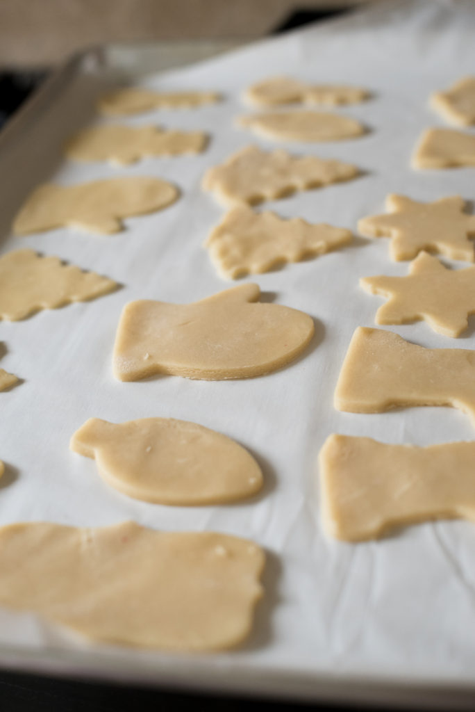 Delicious, buttery, and smooth cut-out sugar cookies perfect for your favorite holiday cookie cutters and adornments. They always hold their shape and stand up well to ALL the frosting and sprinkles! 