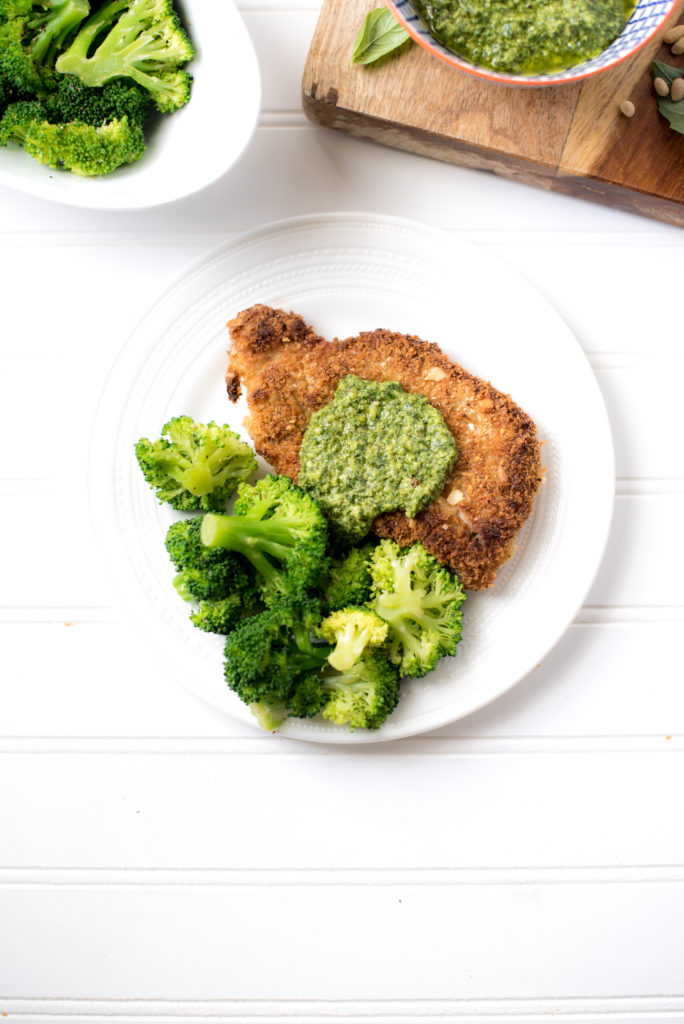 Almond Crusted Chicken Cutlets with Pesto: The nutty flavor from the almonds is slight, but when paired with the garlicky, citrusy pesto it just works! If your family is fond of chicken parmesan, they will adore this recipe for crispy almond crusted chicken and lemon- basil pesto.