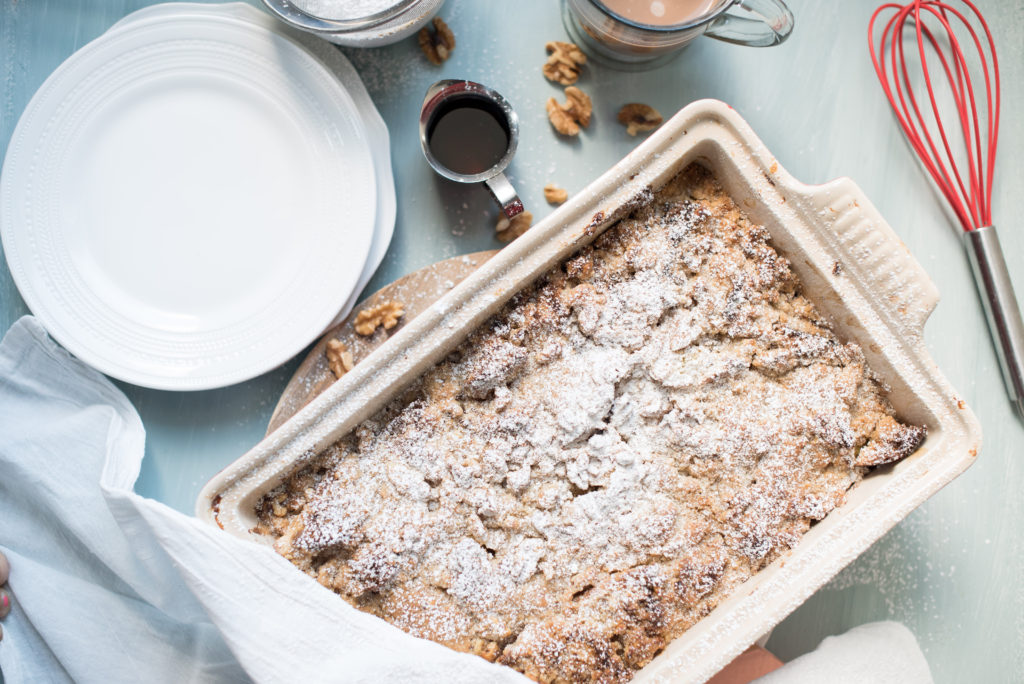 This stuffed cinnamon roll French toast has all the flavors of a homemade cinnamon roll but without all the effort. Sweet, eggy custard poured over brioche bread, stuffed with a sweet cream cheese, topped with a crunch streusel. Heaven in a casserole dish!