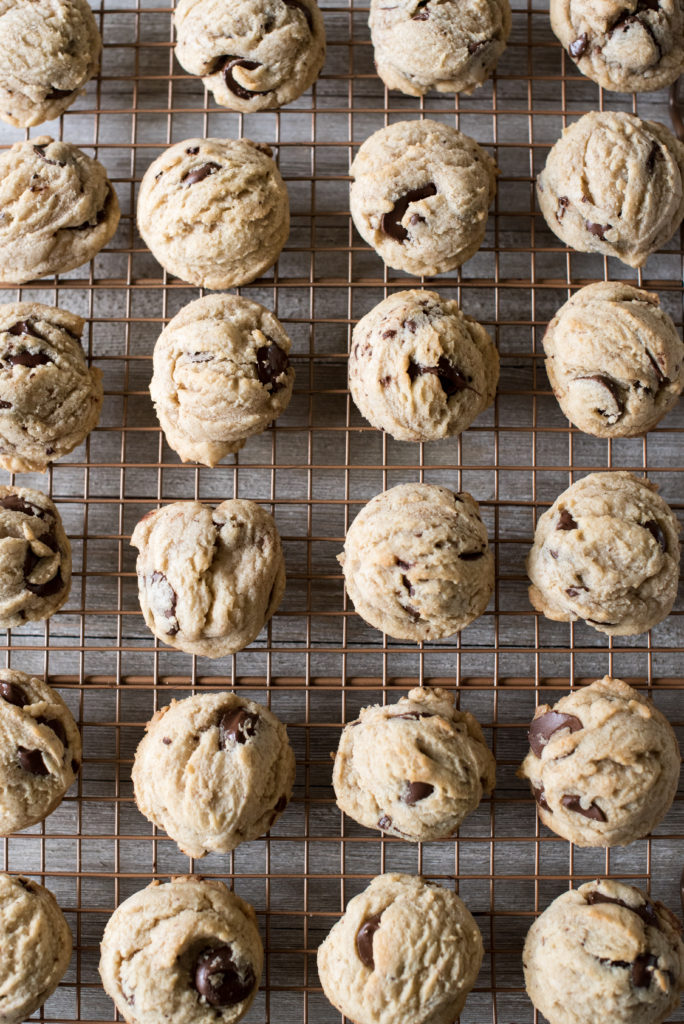 Mini Chocolate Chip cookies on a wire cooling rack