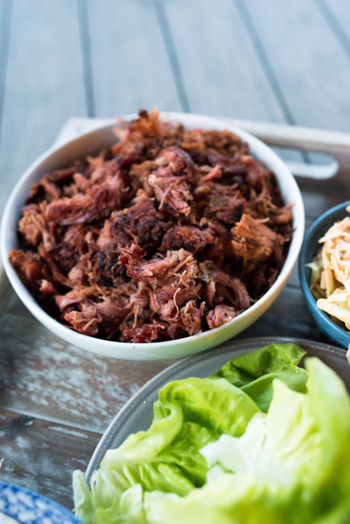 This Crispy Pulled Pork Dinner comes together in less than 10 minutes. Whole30 Compliant pulled pork, seasoned with southwestern spices, loaded in crisp lettuce cups topped with my signature creamy chipotle slaw make for a delicious meal. Clean eating made tasty and easy! 