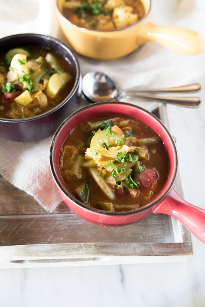 Another great “clean out the fridge” recipe: Vegetable Soup! I encourage you to treat this more as a framework than a recipe. Use what you have and prepare for soul- warming goodness; ladled into a bowl. This soup is surprisingly hearty and perfect for those crisp fall days as the temperatures start to drop.